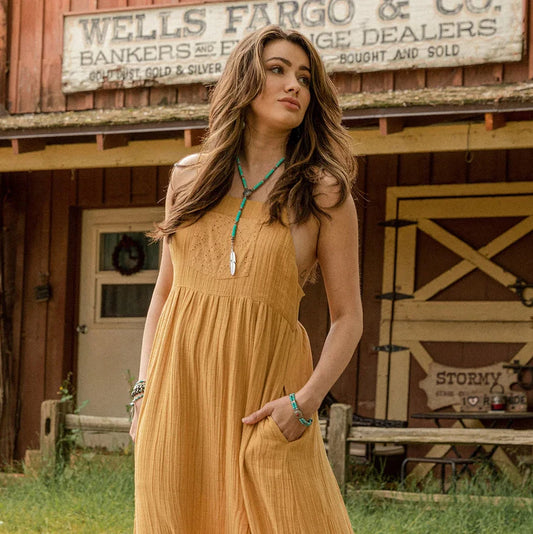 Woman in yellow dress, lifestyle image