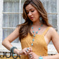 Woman modeling turquoise jewelry