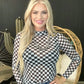 Woman in checkered top