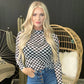 Woman in checkered top and jeans
