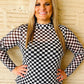 Woman in checkerboard top