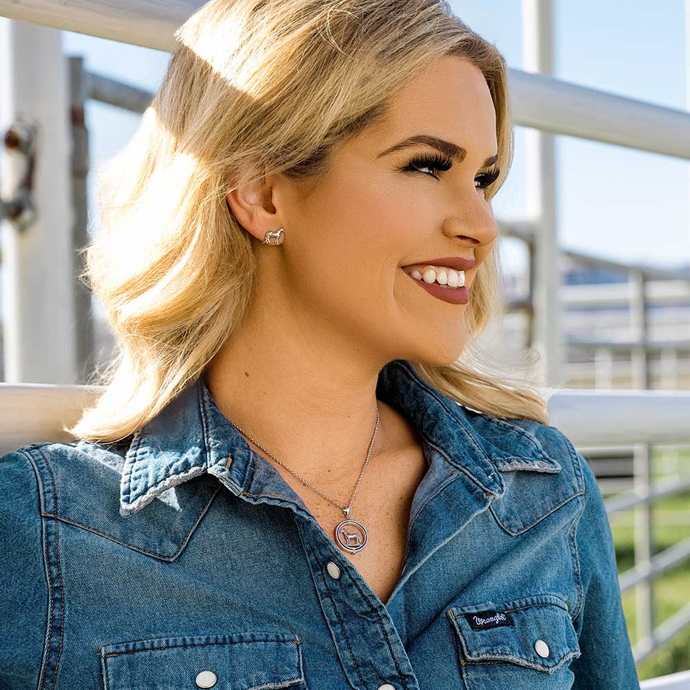 Woman in denim shirt wearing jewelry, e-bynder-QNC5971_mod