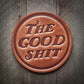 Leather coaster with THE GOOD SHIT text.