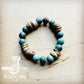 Beaded bracelet with blue and brown beads.