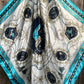 Silk scarf with ornate design.