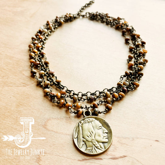 Necklace with Native American coin pendant.