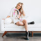 Woman wearing Lexington Bootie in Jet Black