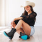 Woman wearing Lexington Bootie in Jet Black