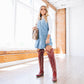 Woman in Smoldering Ruby cowboy boots, Lexington OTK dress