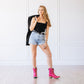 Woman in hot pink Cossette booties