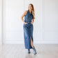 Woman in washed denim dress and Plain Jane booties