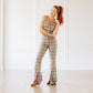 Woman in burnt caramel Plain Jane mule pantsuit