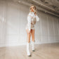 Emma Jane in white outfit, ceramic crackle style, LS11.