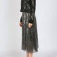 Black leather jacket and sequin skirt outfit