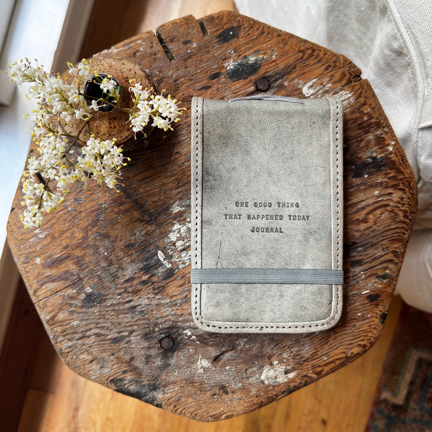 One Good Thing Journal on wooden surface