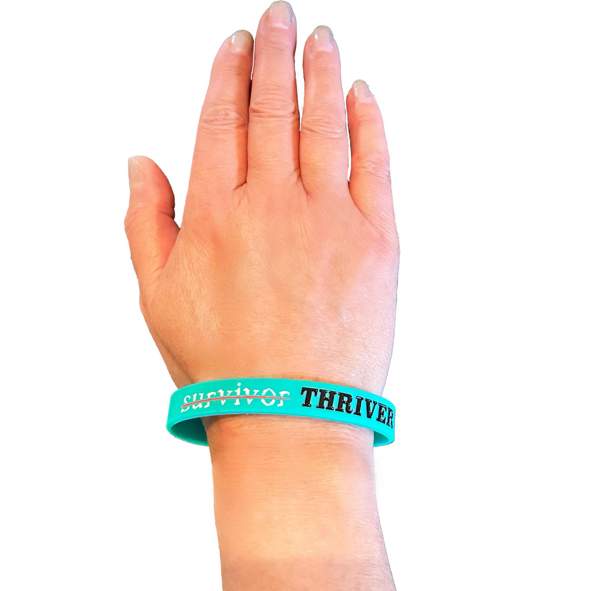 Survivor bracelet Thriver on wrist