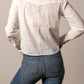 Woman in white patterned shirt and jeans - unnamed-233