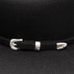 Black hat with silver buckle detail
