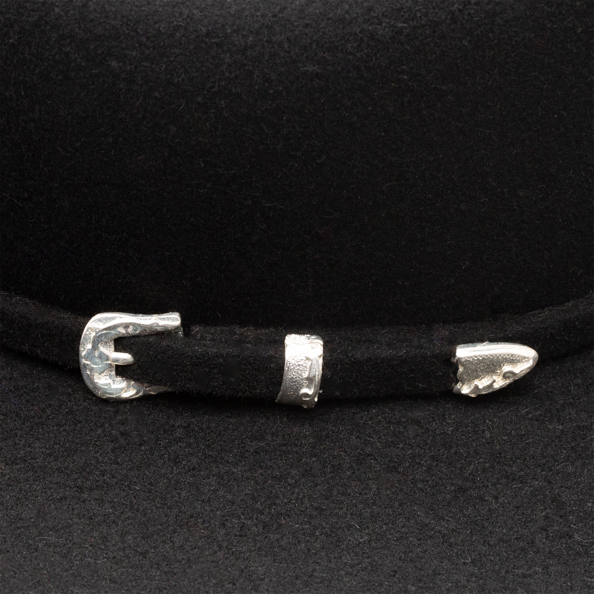 Black hat with silver buckle detail