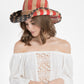 Woman wearing American flag cowboy hat
