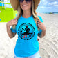Woman wearing turquoise Bourbon Cowgirl tee, sunglasses, and straw hat